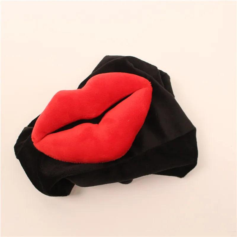 A Silly Sausage Gifts black and red lip-shaped pillow - a perfect gift.