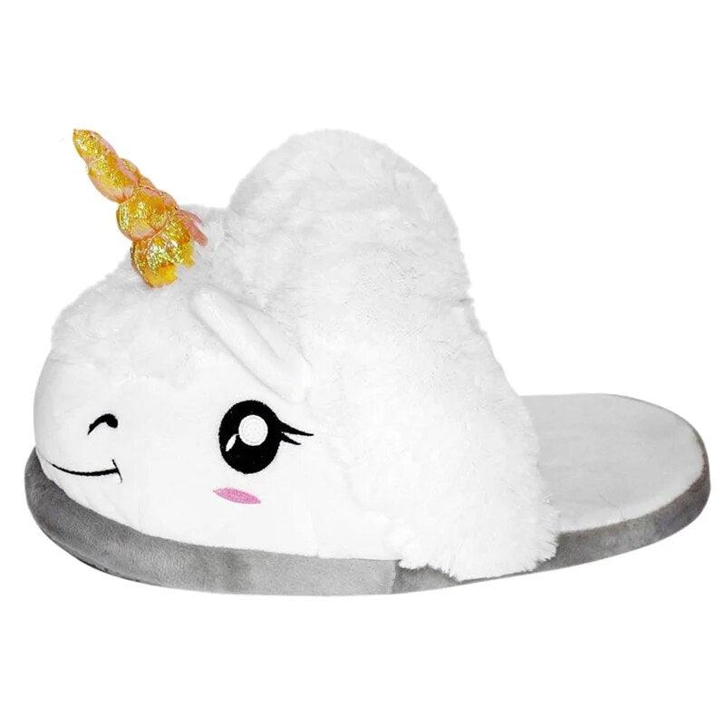A white Animal Slipper from Silly Sausage with cozy comfort and a unicorn head on it.