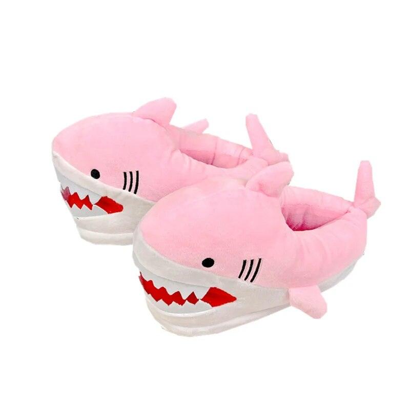 A pair of cozy Silly Sausage pink shark-themed Animal Slippers on a white background.