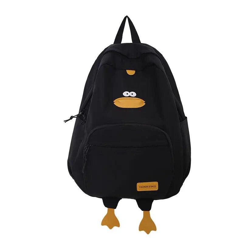 A standout Silly Sausage black Animal Backpack with a yellow bird on it, perfect for gifting.