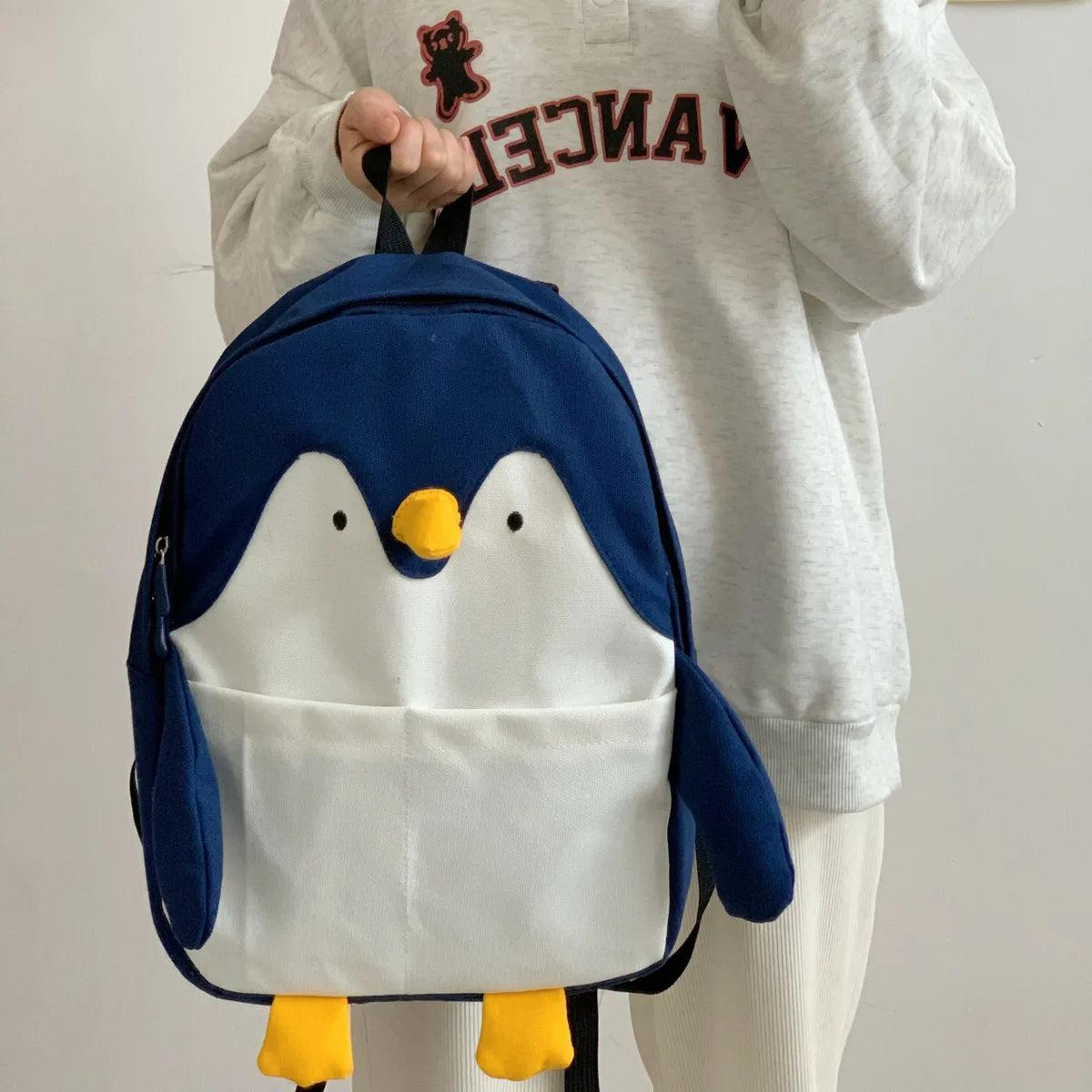 A woman showcasing a standout Silly Sausage penguin Animal Backpack, an ideal gift.