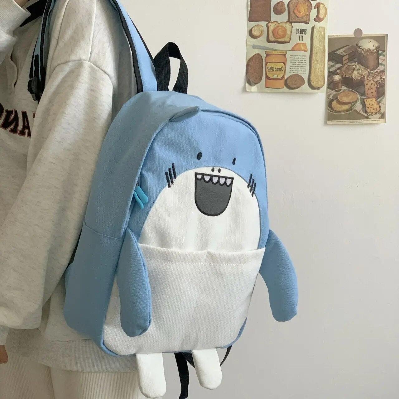 A standout girl with a Silly Sausage Animal Backpack, featuring a shark, making it the perfect gift.